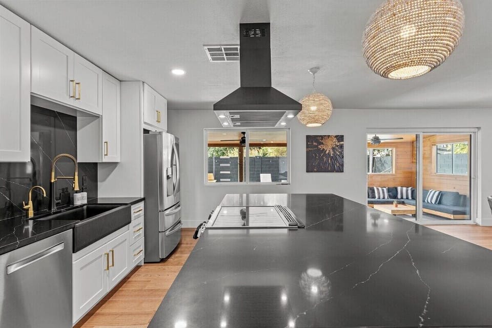 Unleash your culinary creativity in our fully-equipped kitchen. Modern Luxury