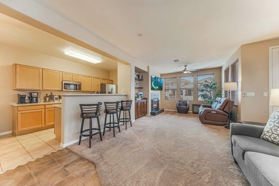 Welcome to the heart of our stylish retreat! Our living room exudes comfort and modern charm, featuring plush furnishings and contemporary decor.