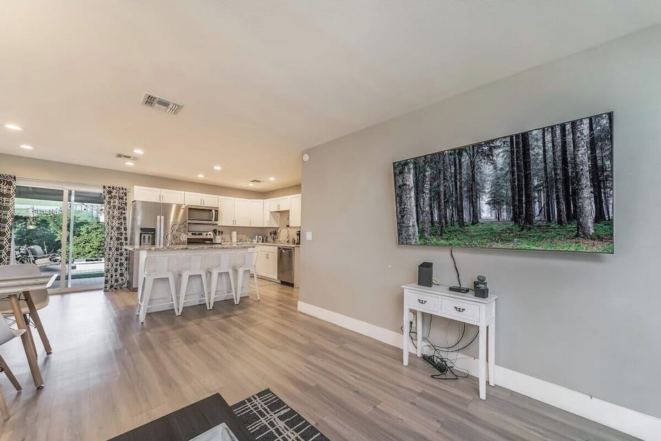 Kick back on the sofa, catch up on your favorite shows on the smart TV, or simply enjoy the company of friends and family in this inviting space.