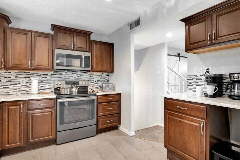 Fully stocked kitchen with all the essentials for home cooking.