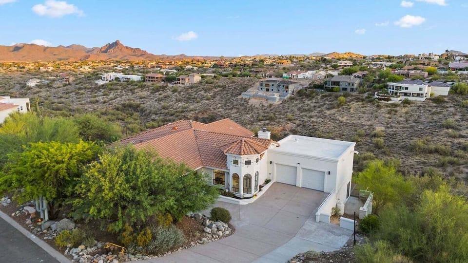 Estate surrounded by mountains.