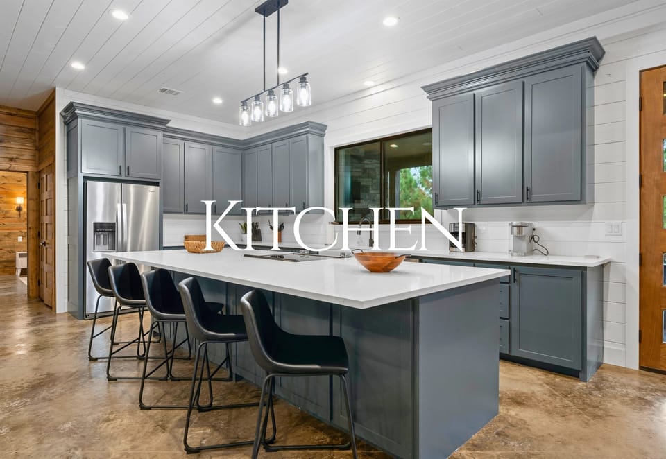 Bright, modern kitchen with bar seating and plenty of space to cook.
