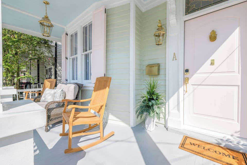 Front porch with private seating area overlooking Cannon St