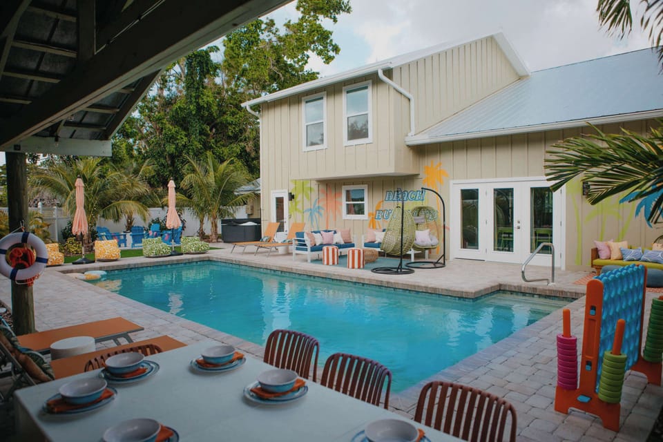 From sunny pool days to starlit firepit nights, this backyard has it all — a sparkling pool, hot tub, putting green, basketball hoop, outdoor bar, and endless space for fun and relaxation. Your private paradise awaits!