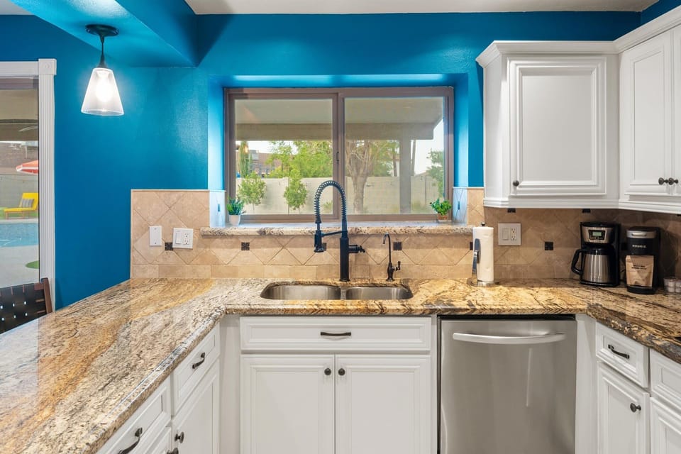 Who needs a restaurant when you have this? Our kitchen is a culinary playground with all the tools of the trade. Cook up a storm, enjoy a casual meal, or just grab a snack – it’s all here, wrapped in a vibrant and inviting package.