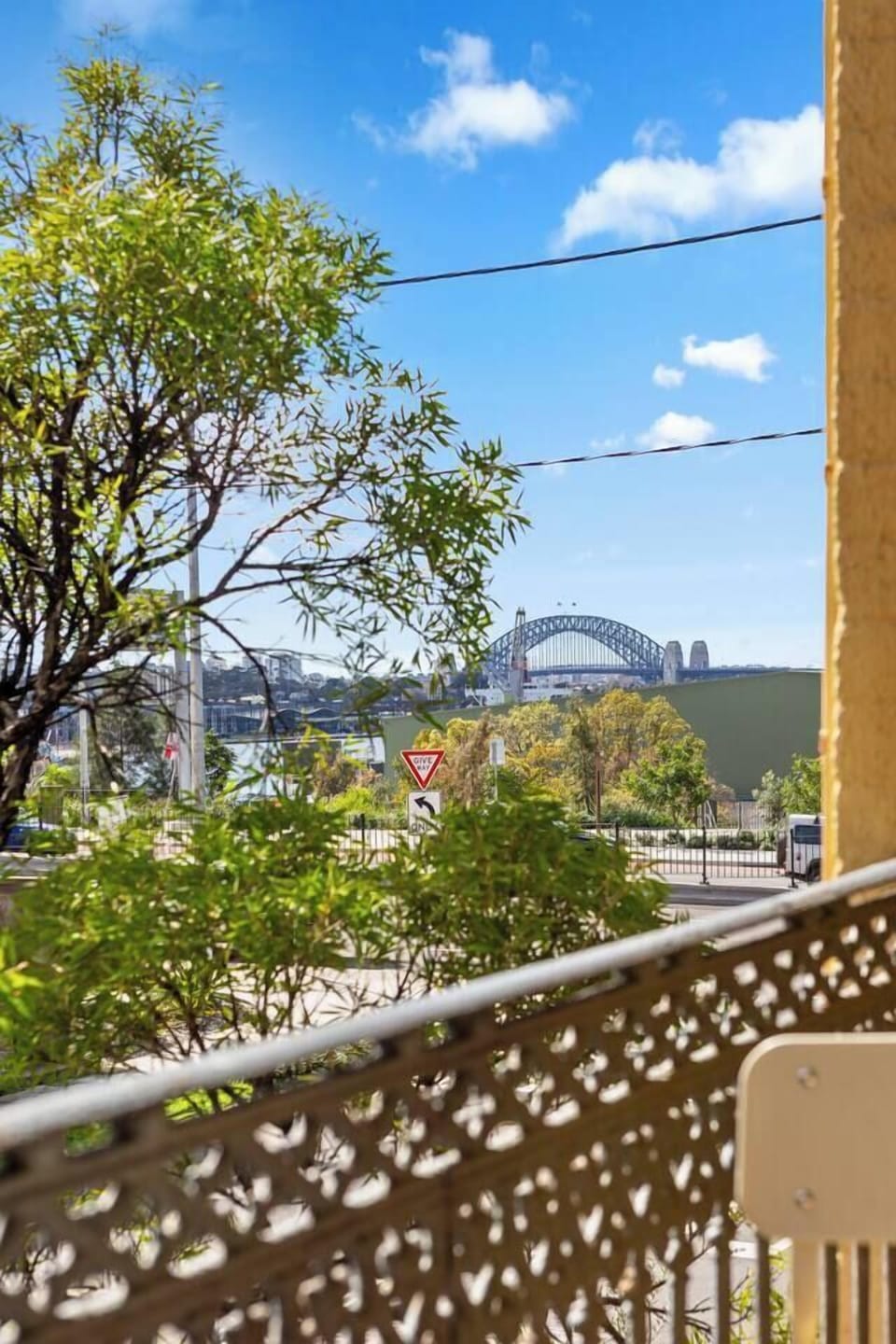 Take in treetop outlooks and glimpses of the Harbour Bridge from your private balcony.