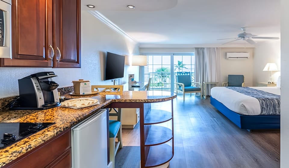 Start beach days easy with coffee, snacks, and granite counters.