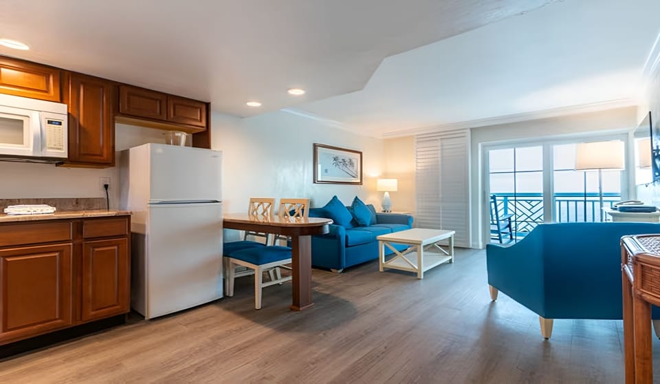 Gather for cocktails in a bright, breezy open-plan suite.