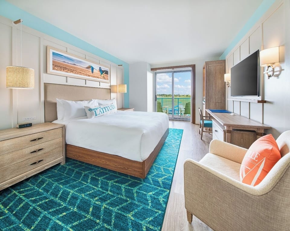 Unwind in a sunlit room with serene balcony views.