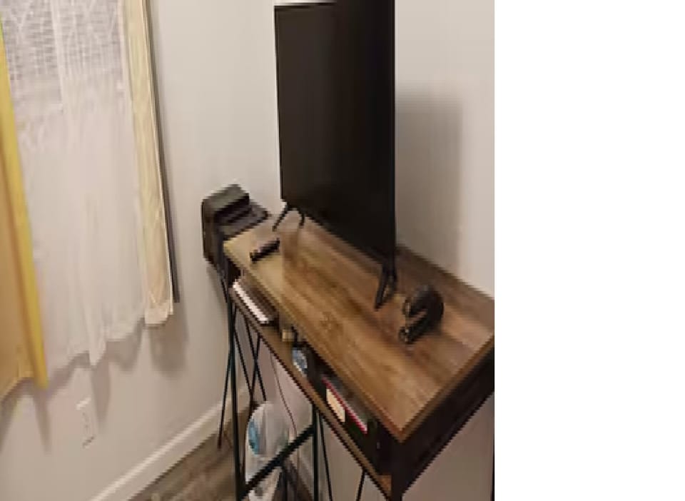 Office Area - Computer Screen / TV, desk and printer