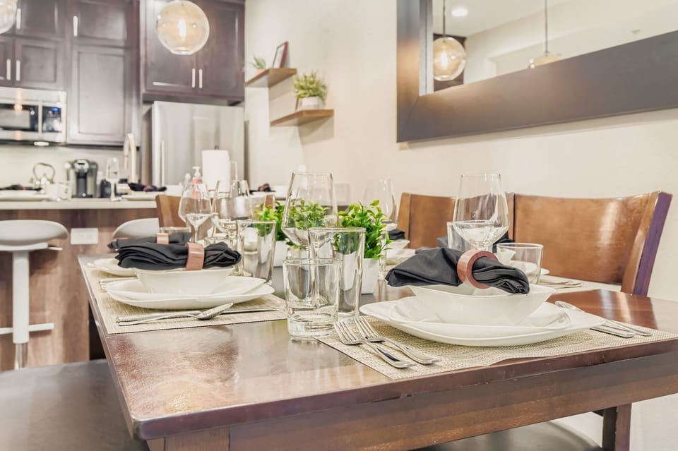 Our elegant dining area is ready for memorable meals. The connected kitchen provides everything needed for easy preparation and entertaining during your Park City getaway.