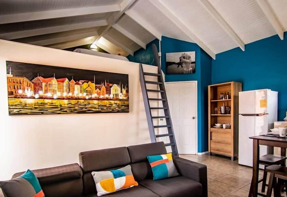 Stairs to attic with Full size bed