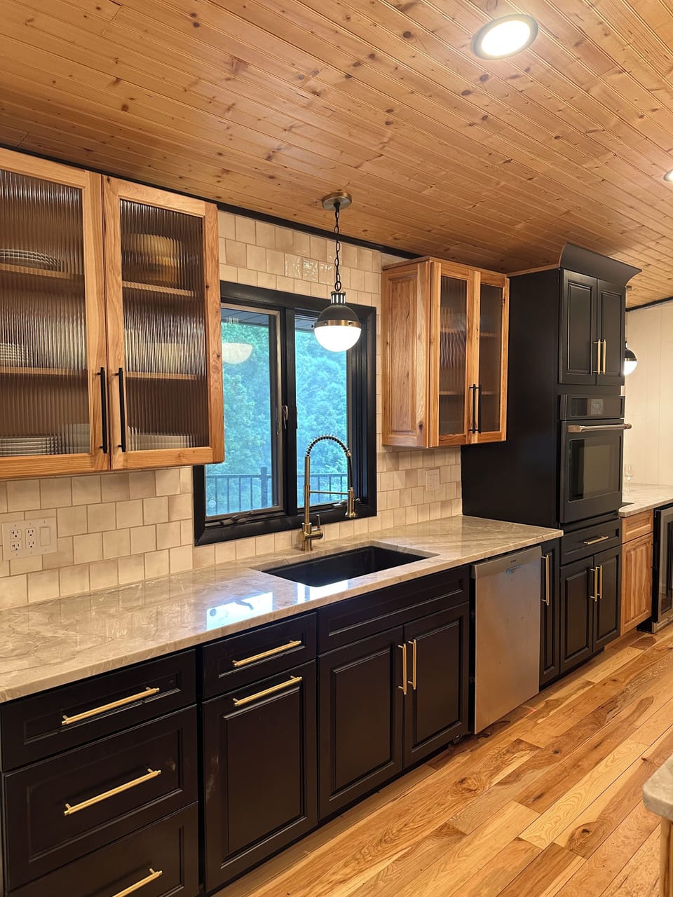 Generous kitchen space with large sink, prep/beverage sink and 2 ovens.