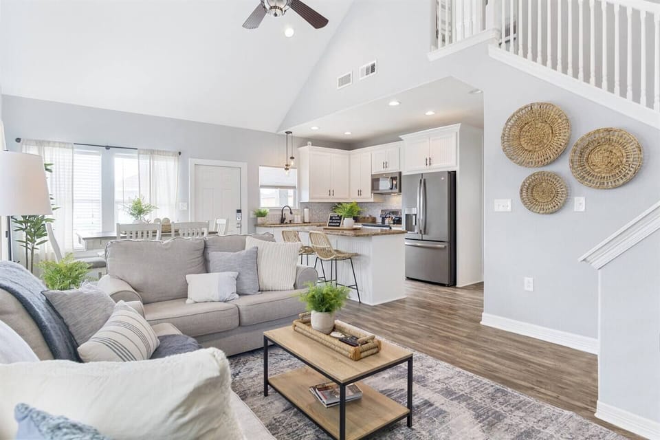 A seamless blend of comfort and style, where light and design create an inviting space for both relaxation and entertainment.