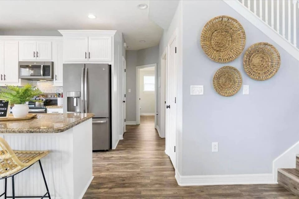 Bask in the charm of this airy and inviting kitchen, where natural textures and light hues create a tranquil escape for culinary creativity.