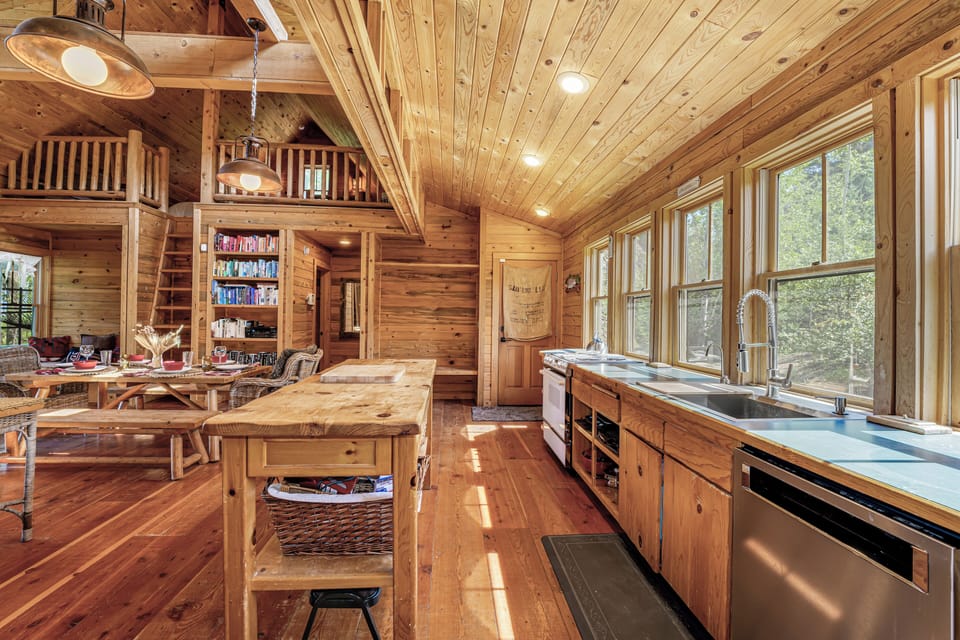 A large wood island giving lots of room to cook meals with friends and family | Main Level