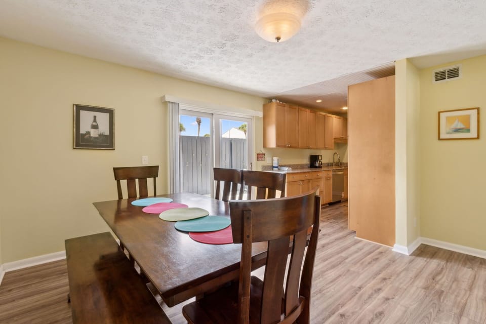 Dining area with seating for 6 and access to back patio