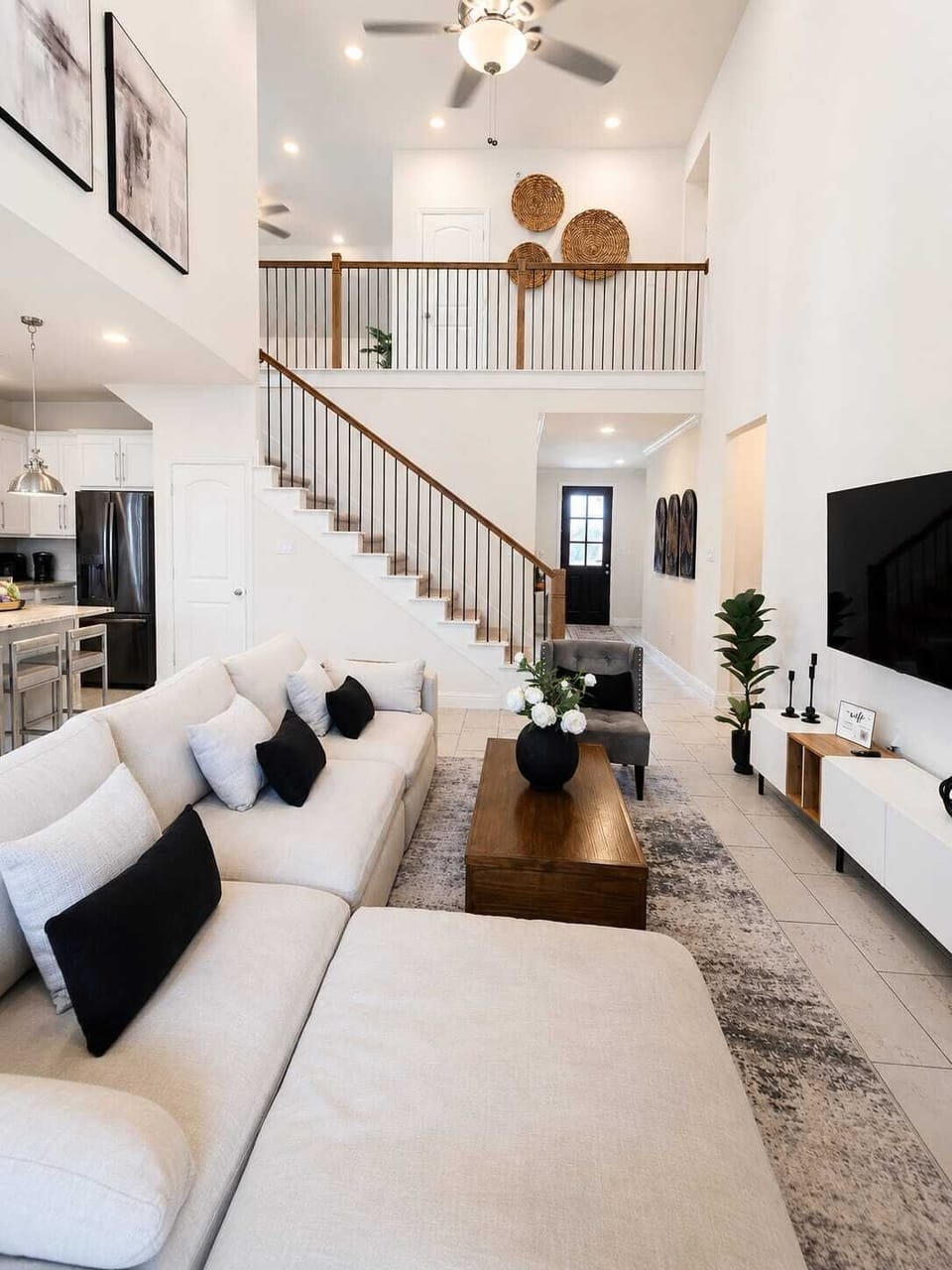 Modern family and corporate retreat with soaring ceilings, fireplace, Smart TV, and open-concept living near Rockwall, Lake Ray Hubbard, and Downtown Dallas.
