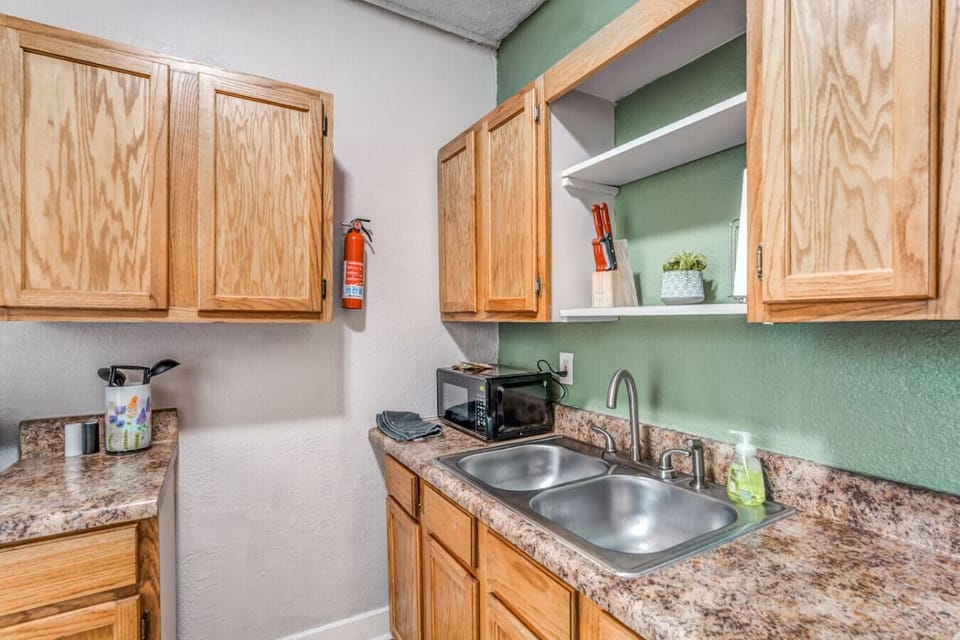 Enjoy the convenience of a well-stocked kitchen for cooking or light snacks.