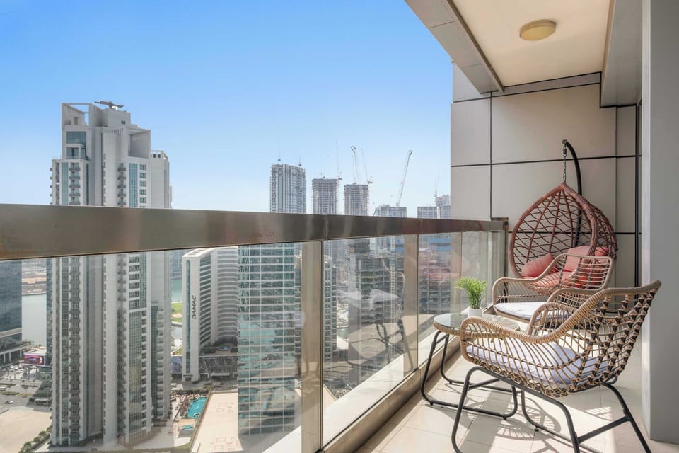 Sunny balcony perfect for morning coffee overlooking the city