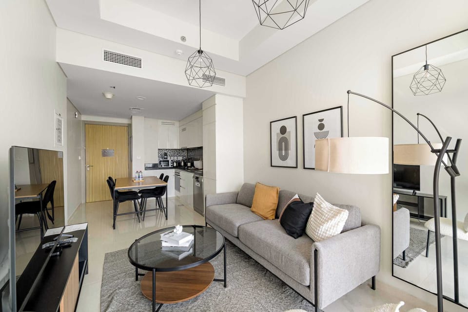 Relax in a cozy living area filled w/ soft natural light.