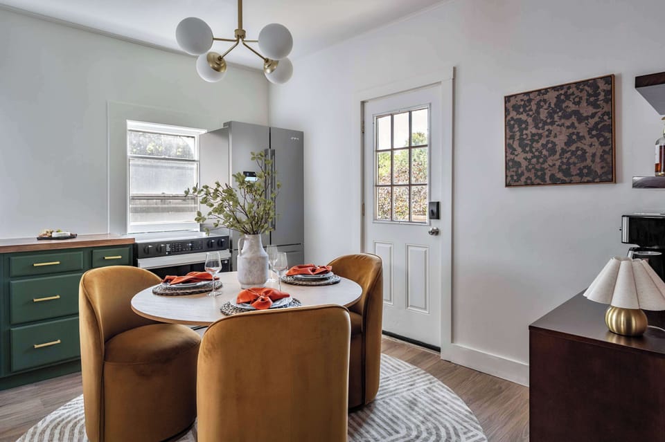 Where every meal feels like a celebration! Our stylish dining nook is perfect for shared stories and delicious feasts, with a fully-equipped kitchen just steps away. 