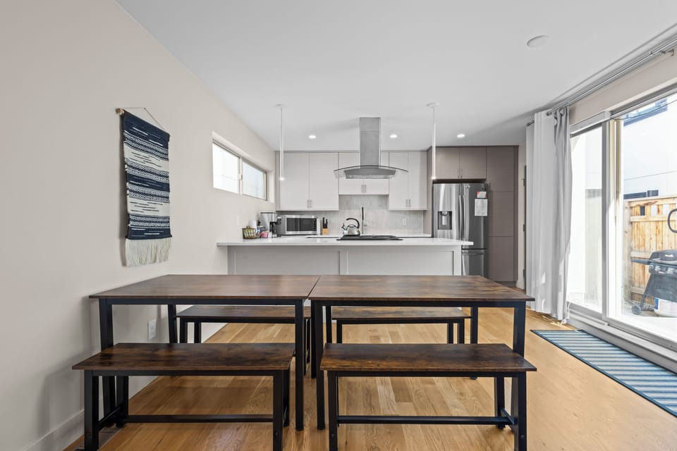 A bright, practical kitchen with abundant natural light.