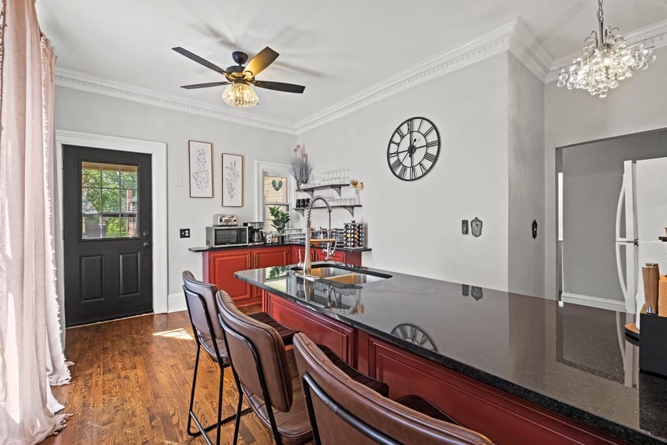 Kitchen also has access to a back upper deck with outdoor seating