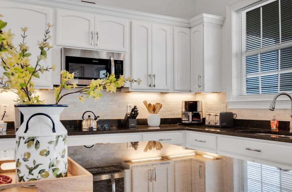 Fully equipped kitchen with stainless steel appliances and everything needed for home-cooked meals