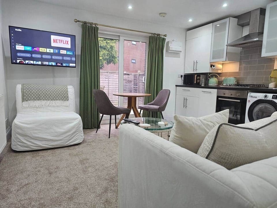 Comfotable open plan living with dining area, smart TV, dishwasher, washer dryer, fridge freezer