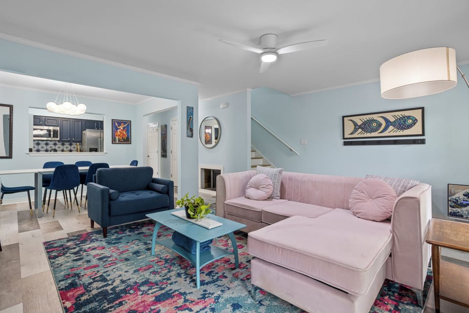 Comfy living room open to adjacent dining room. 