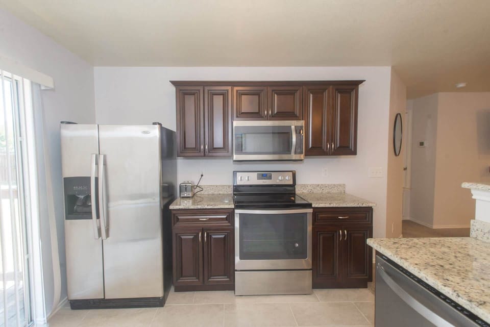 The inviting kitchen offers ample space & every home comfort​