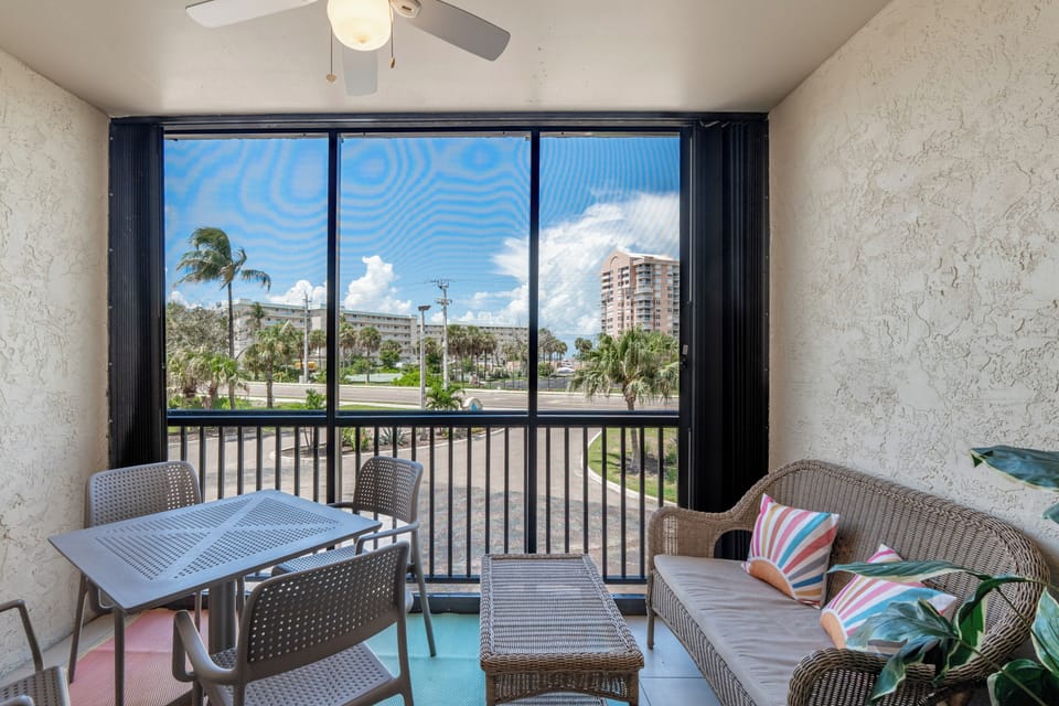 Take a seat on the balcony with views of the beach.