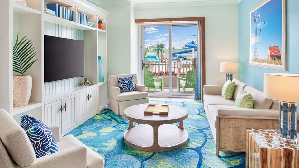 Gather on plush sofas and watch movies after beach days.
