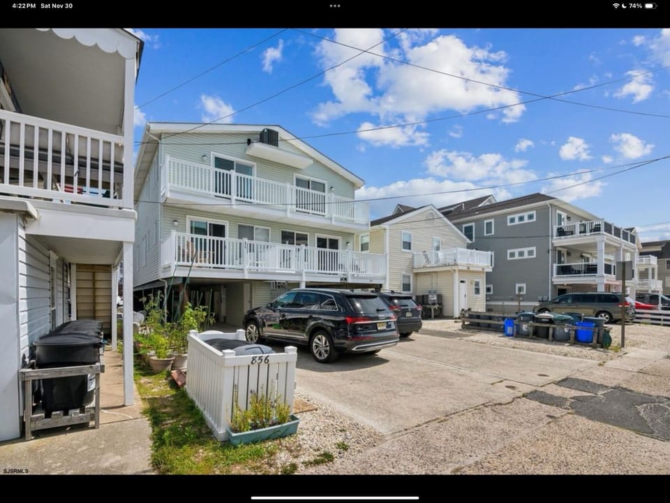 Parking area off alley behind duplex
