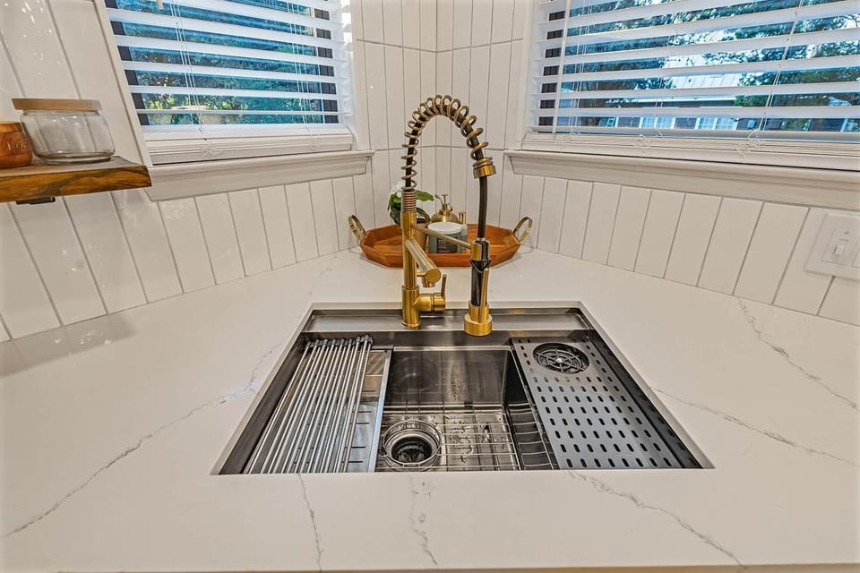 Glass Rinser in the Kitchen Sink