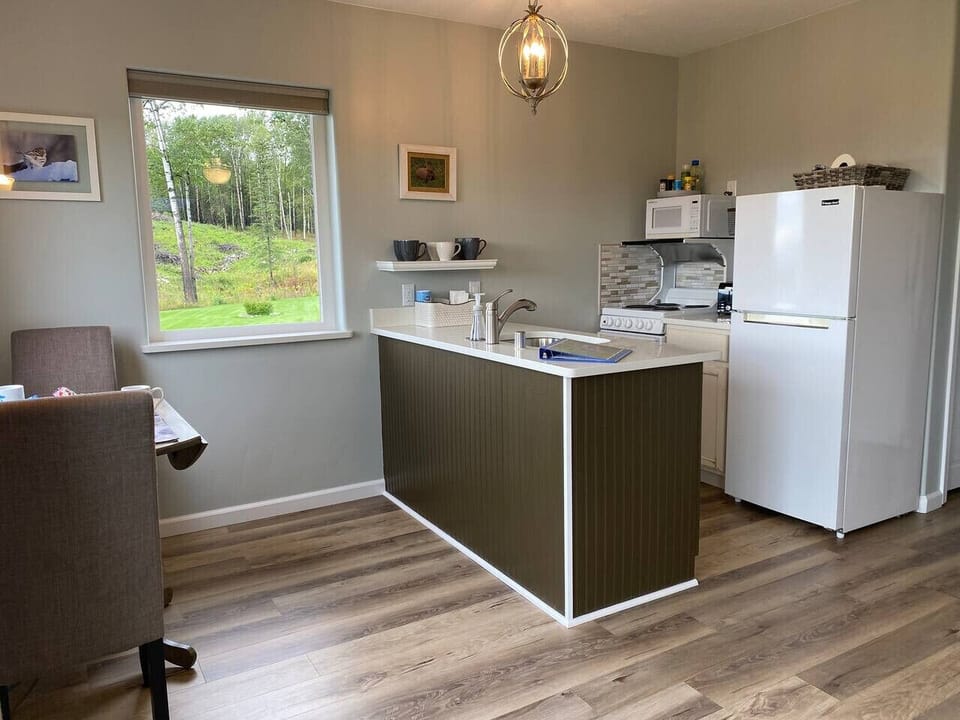 Kitchen with natural landscape and grass
