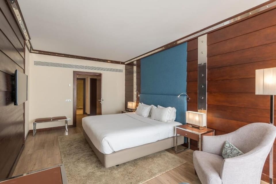 Stretch out in a spacious bedroom designed for deep rest.