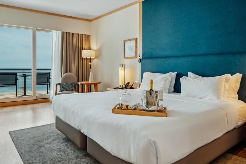 Step onto your balcony and breathe in endless sea views.