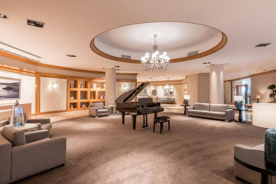 Arrive in style to a bright, elegant reception lobby.