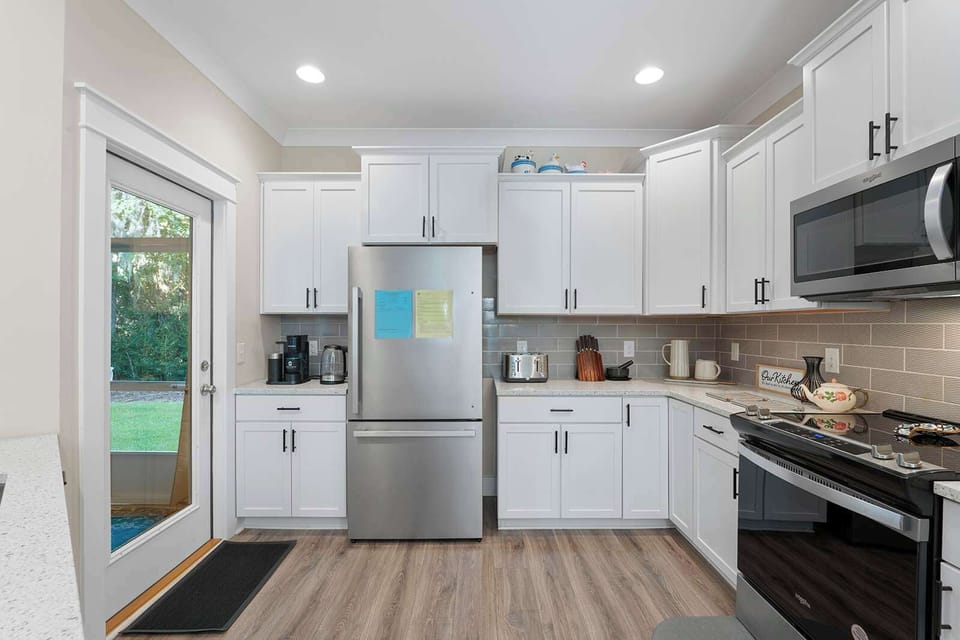 Large kitchen with all the tools you need to prepare meals for friends and family