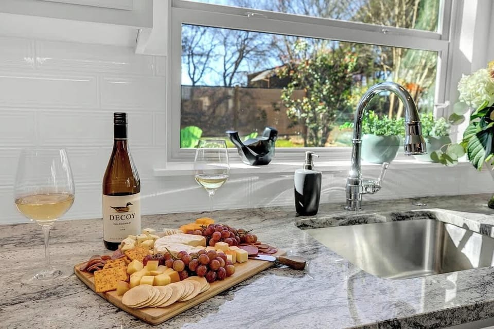Enjoy a Delicious cheeseboard and wine!