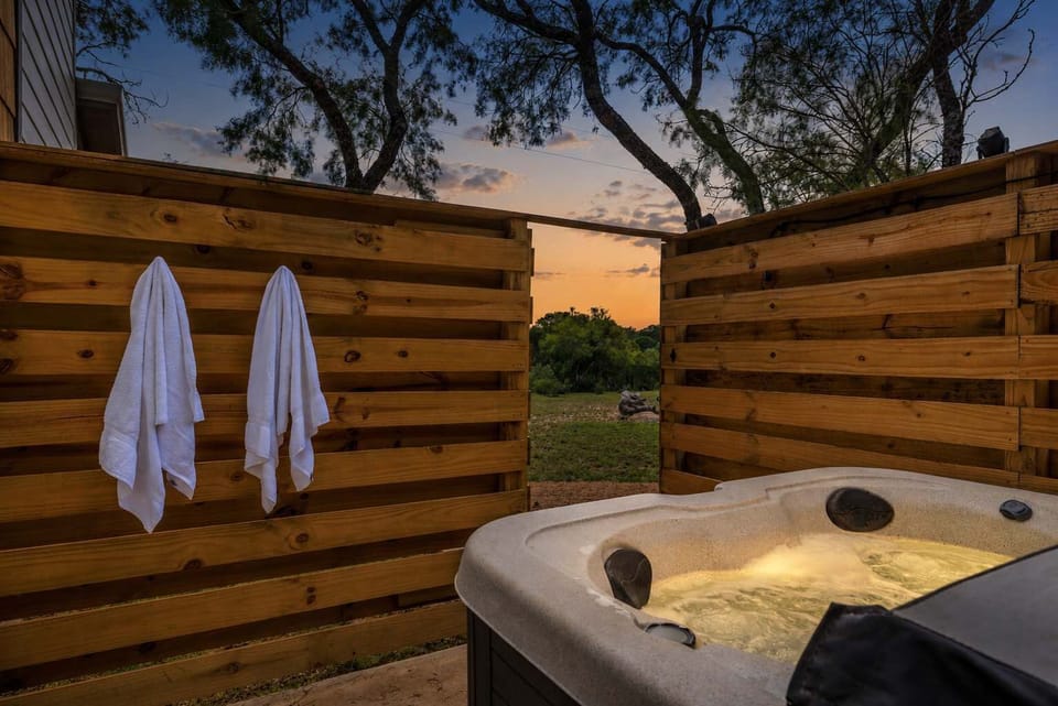 Enjoy a romantic or relaxing evening under the stars and oak trees soaking in your private hot tub! 