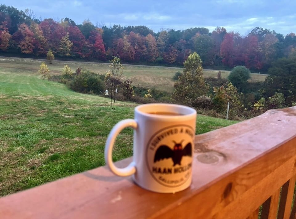 Have coffee on the front porch overlooking beautiful views. Coffee bar stocked.