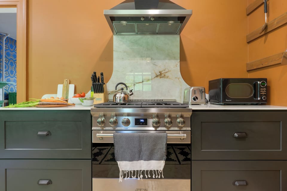 Kitchen range and hood.