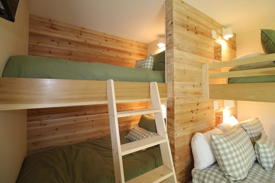 Bunkroom is not just for the kids but can accomodate an adult couple, queen bed