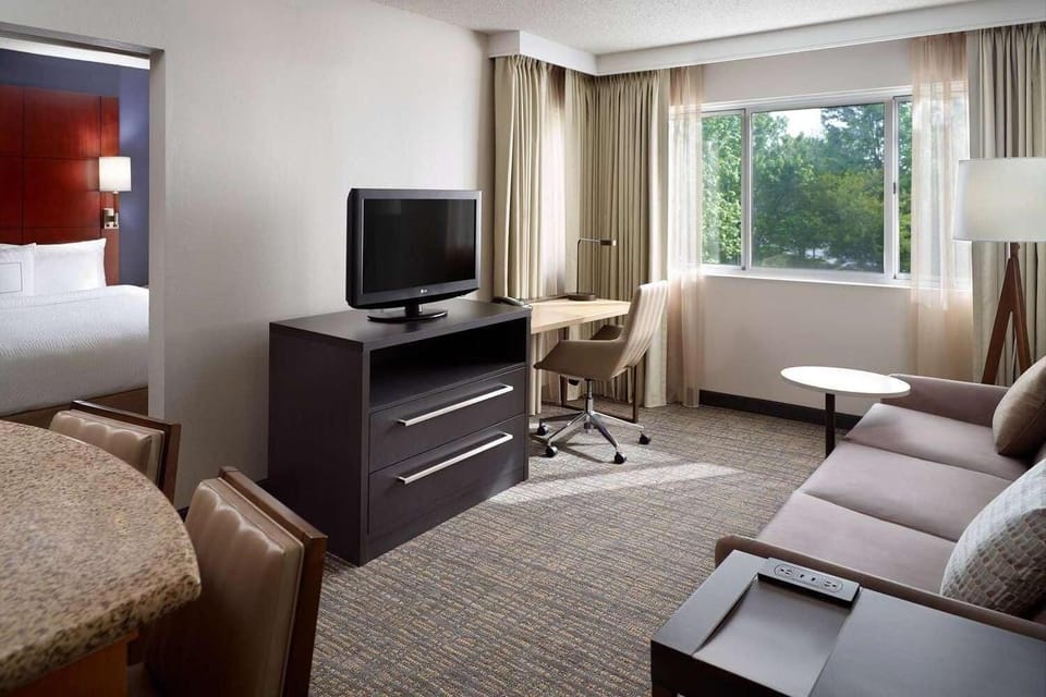 Stretch out in the spacious lounge with desk and big TV.