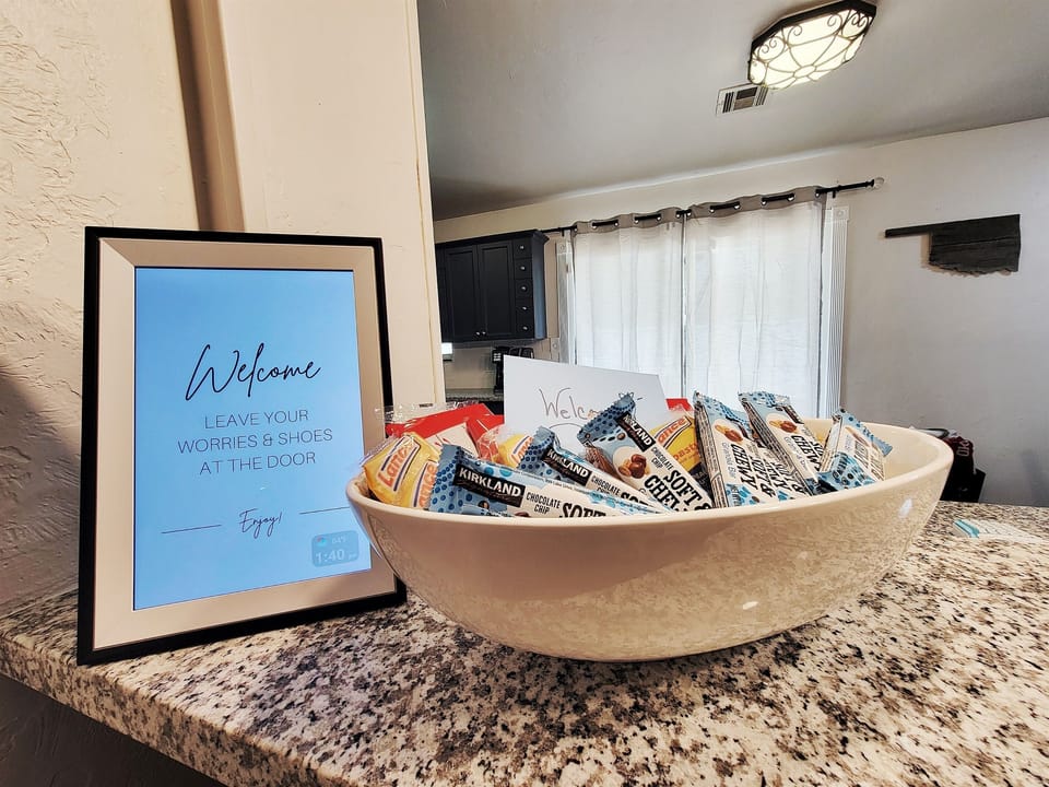 Welcome snacks and a photo frames that has answers to many FAQs