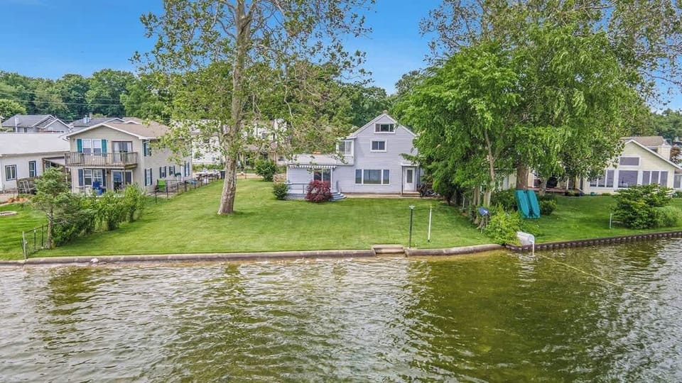 Drone shot of the house from the water