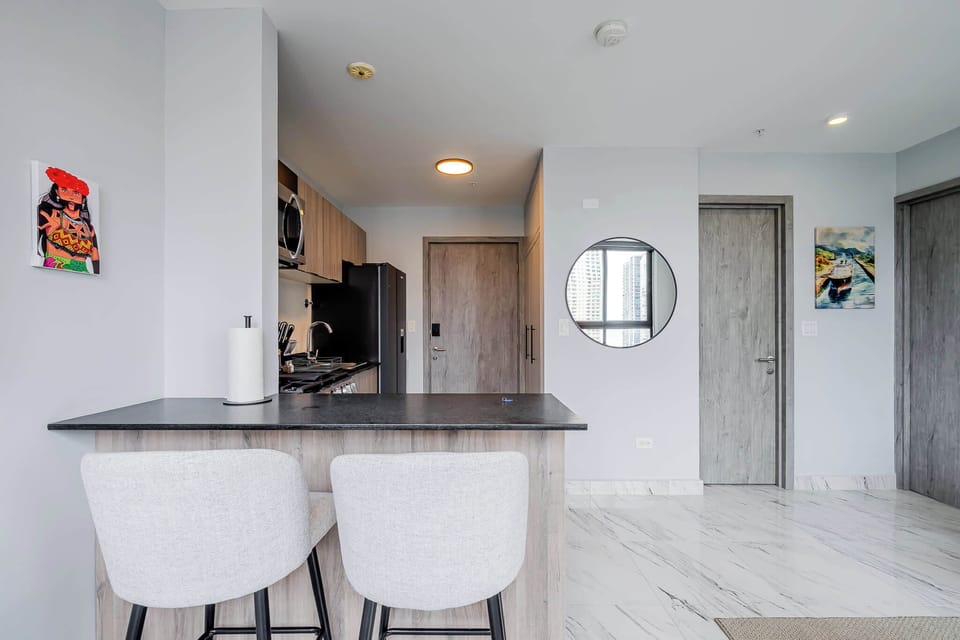 Stylish dining table next to the kitchen.